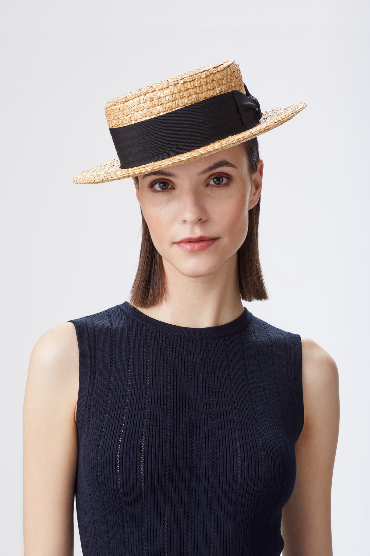 feminine look with straw hat