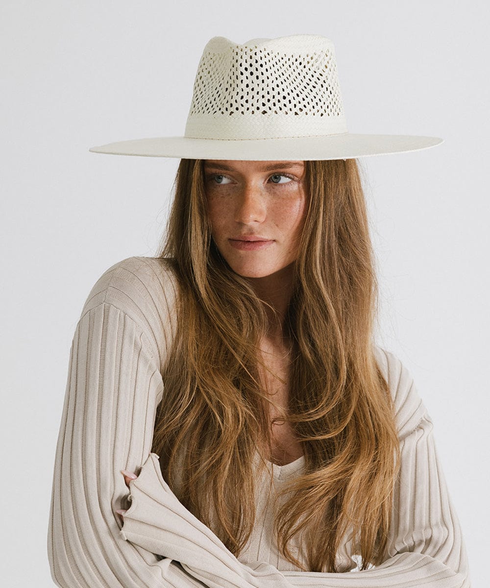 feminine look with straw hat