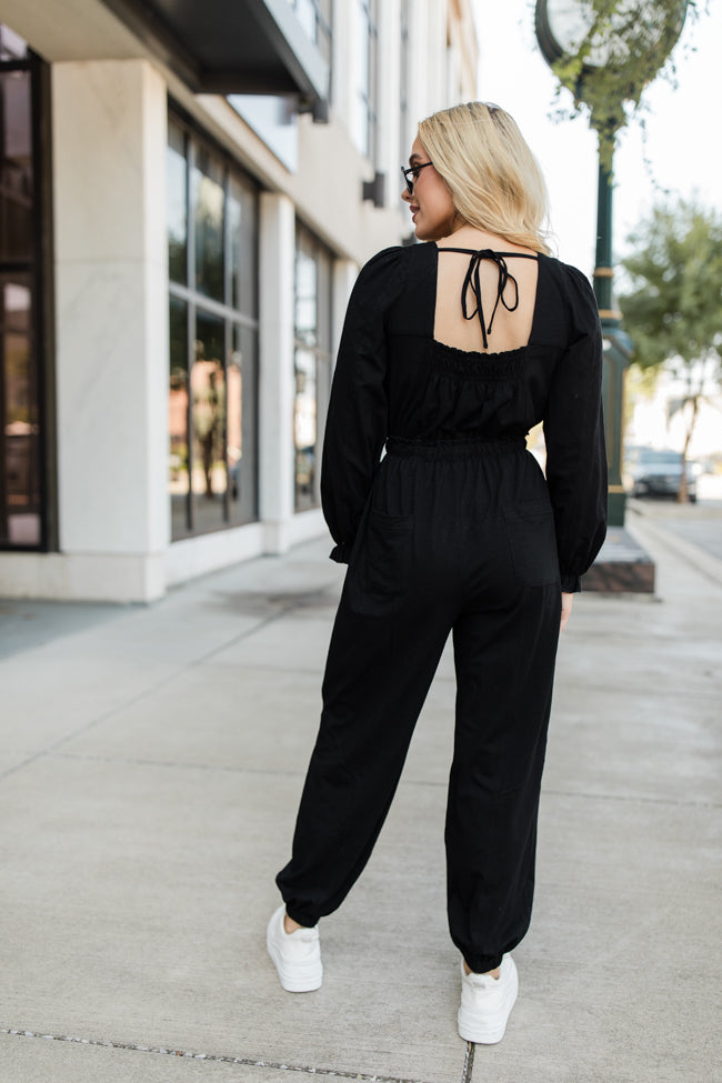 fashion woman look with black jumpsuit