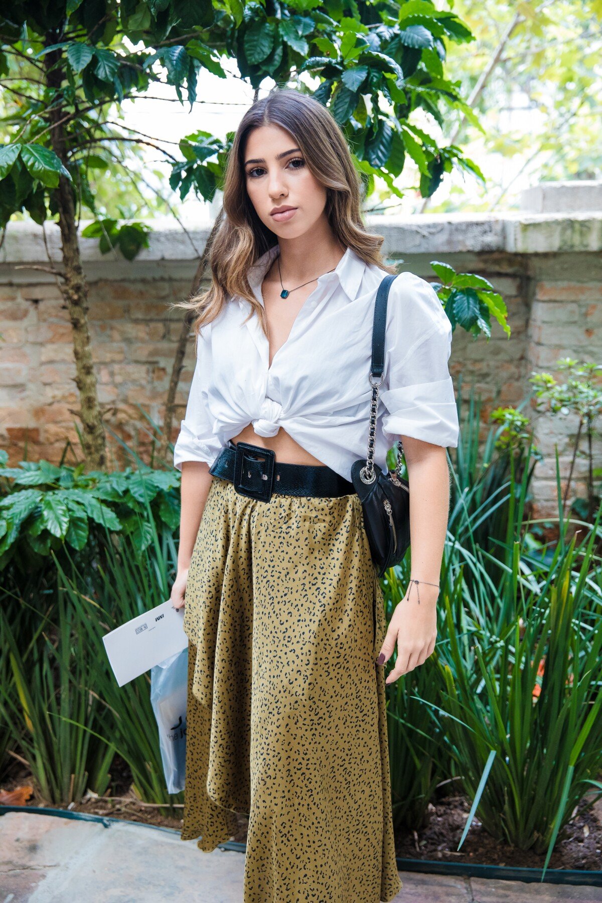 look saia de onça Feminino