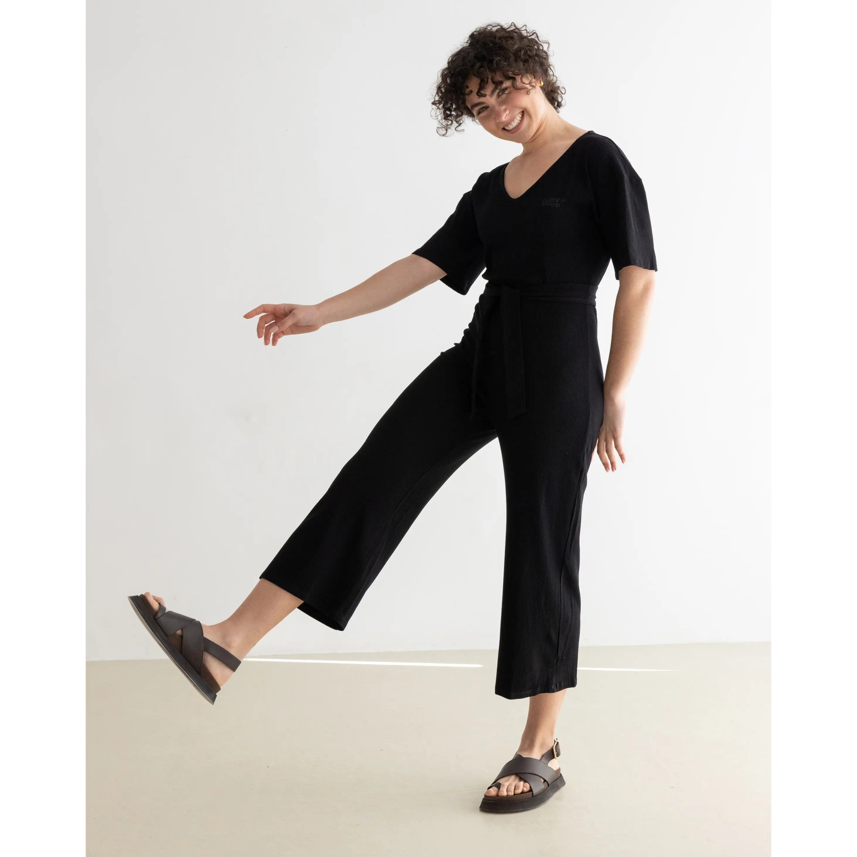 fashion woman look with black jumpsuit