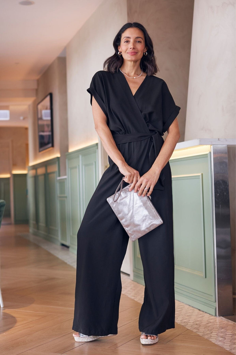 fashion woman look with black jumpsuit