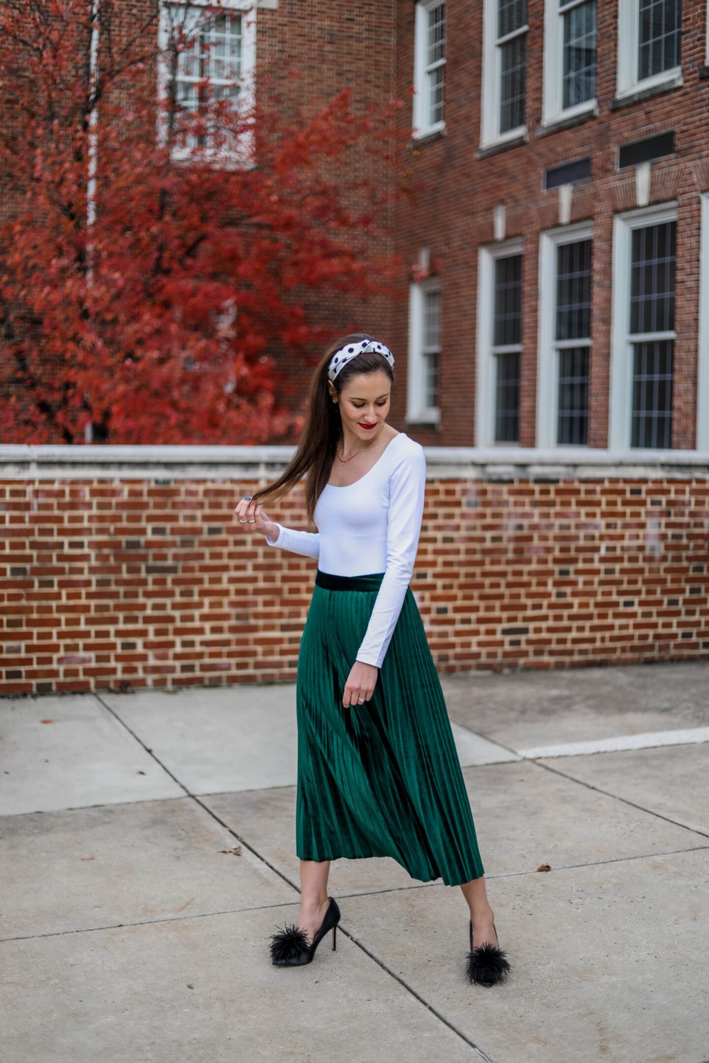 fashion woman look with pleated midi skirt