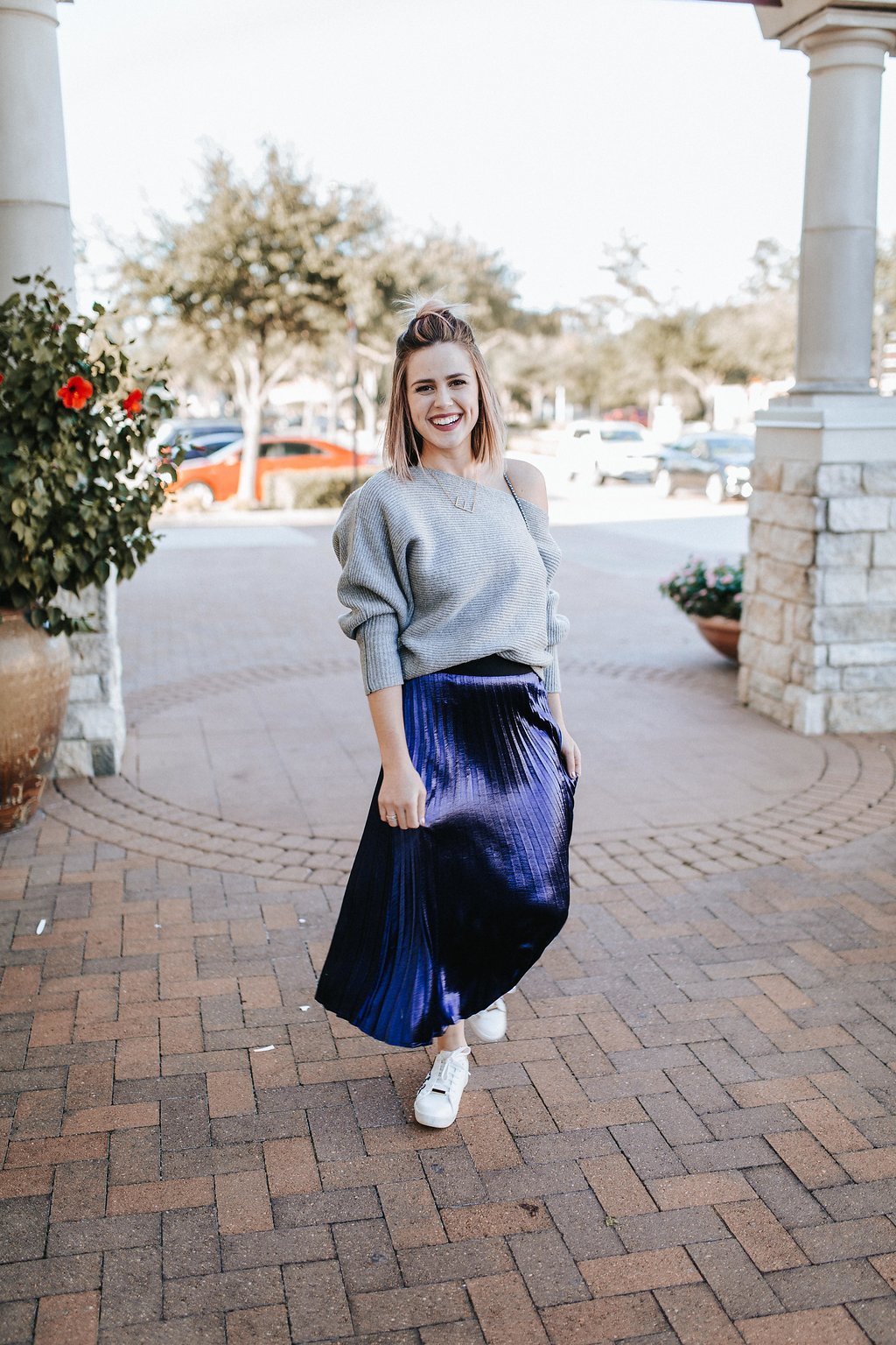 fashion woman look with pleated midi skirt