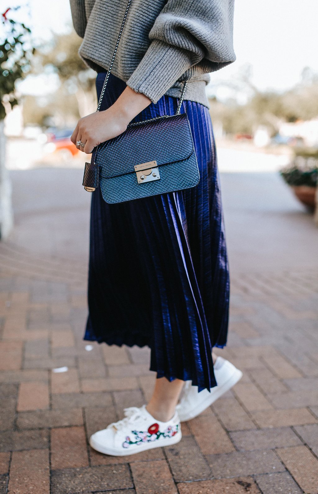 fashion woman look with pleated midi skirt