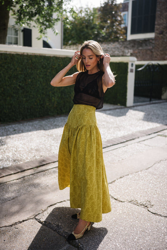 fashion woman look with yellow skirt