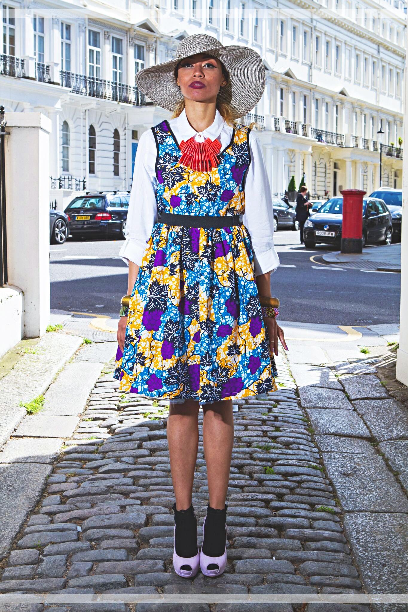 fashion woman look with pleated midi skirt