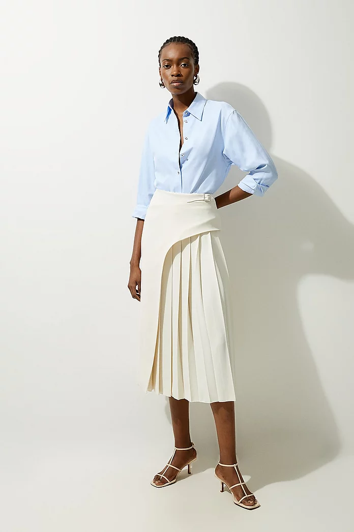 fashion woman look with pleated midi skirt