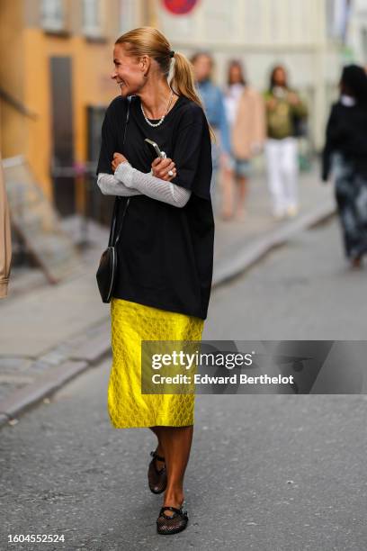 fashion woman look with yellow skirt