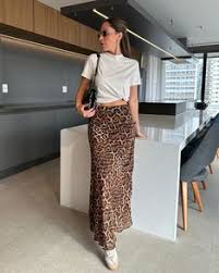 look saia de onça Feminino