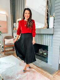 fashion woman look with pleated midi skirt