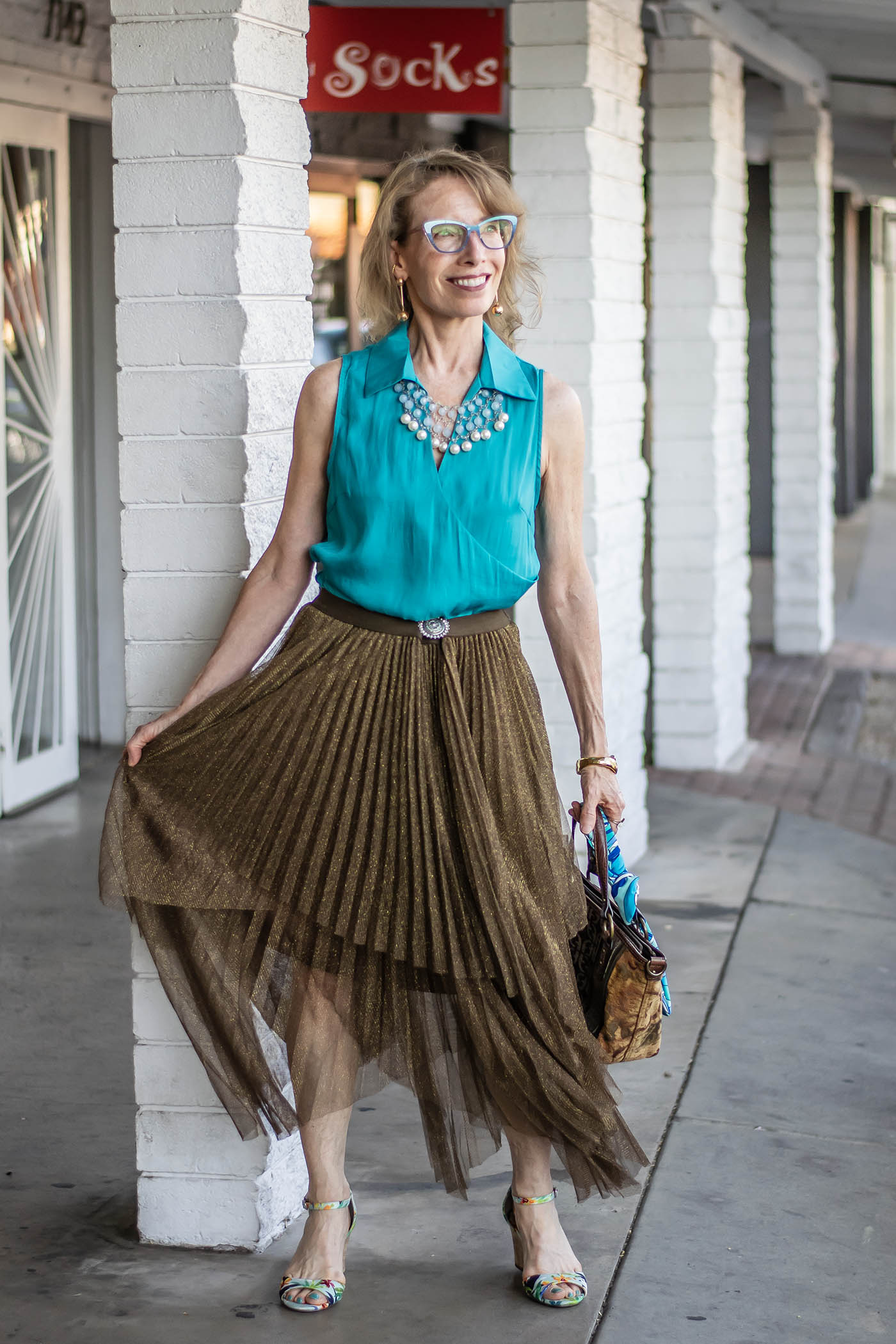 fashion woman look with pleated midi skirt