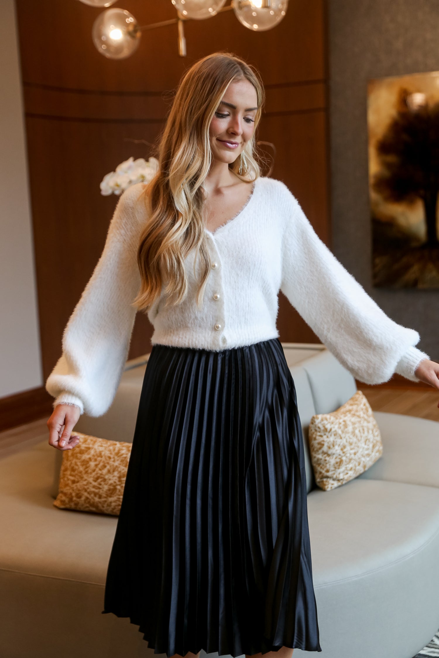 fashion woman look with pleated midi skirt