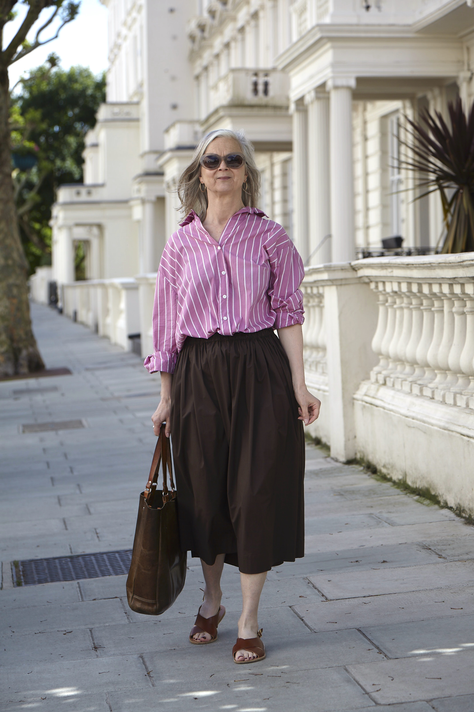 fashion woman look with striped skirt